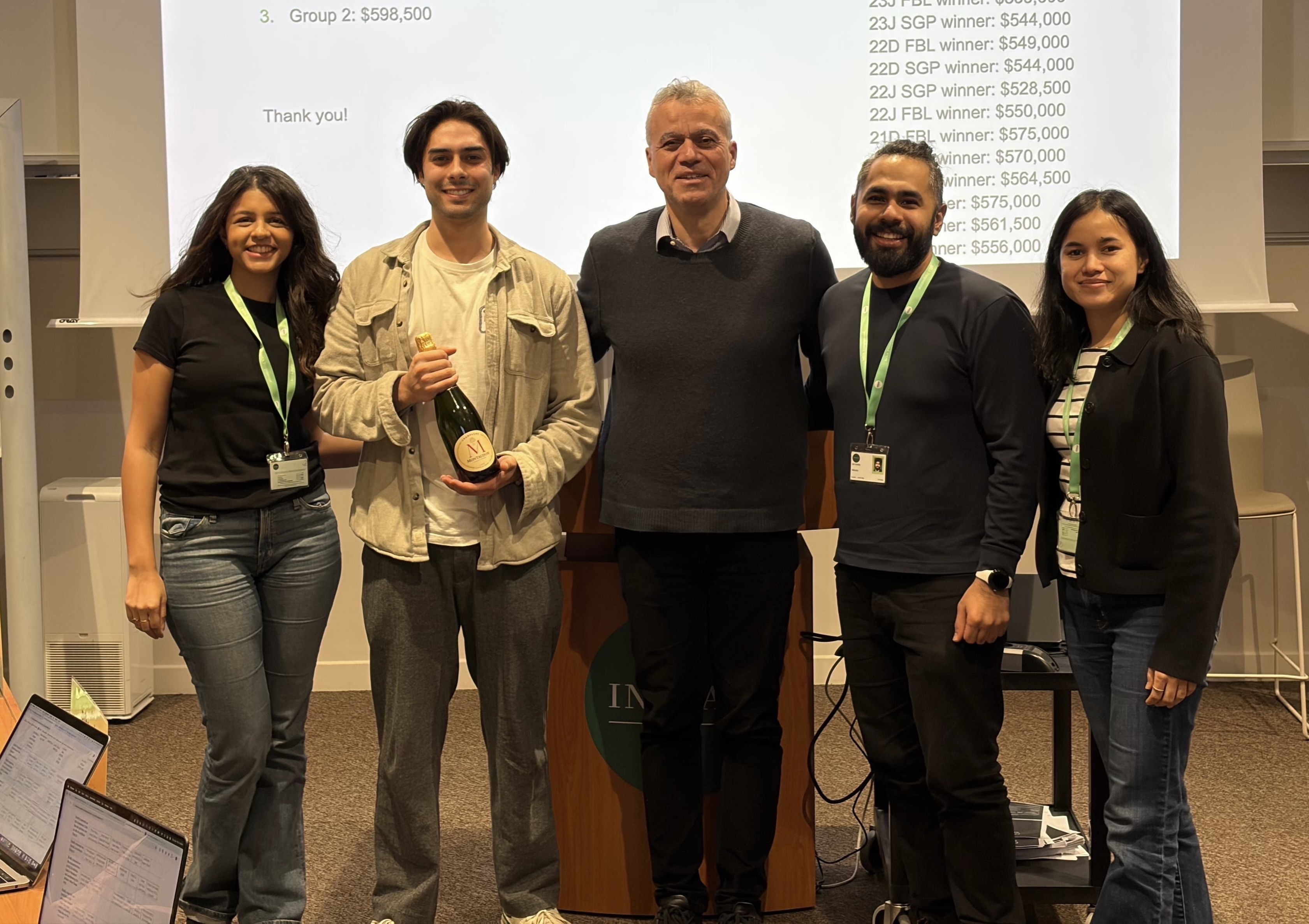 Photo of Everett's Team and their professor after winning an AI competition